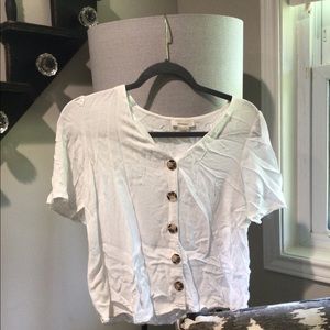 Simple white button up shirt. Size M-L